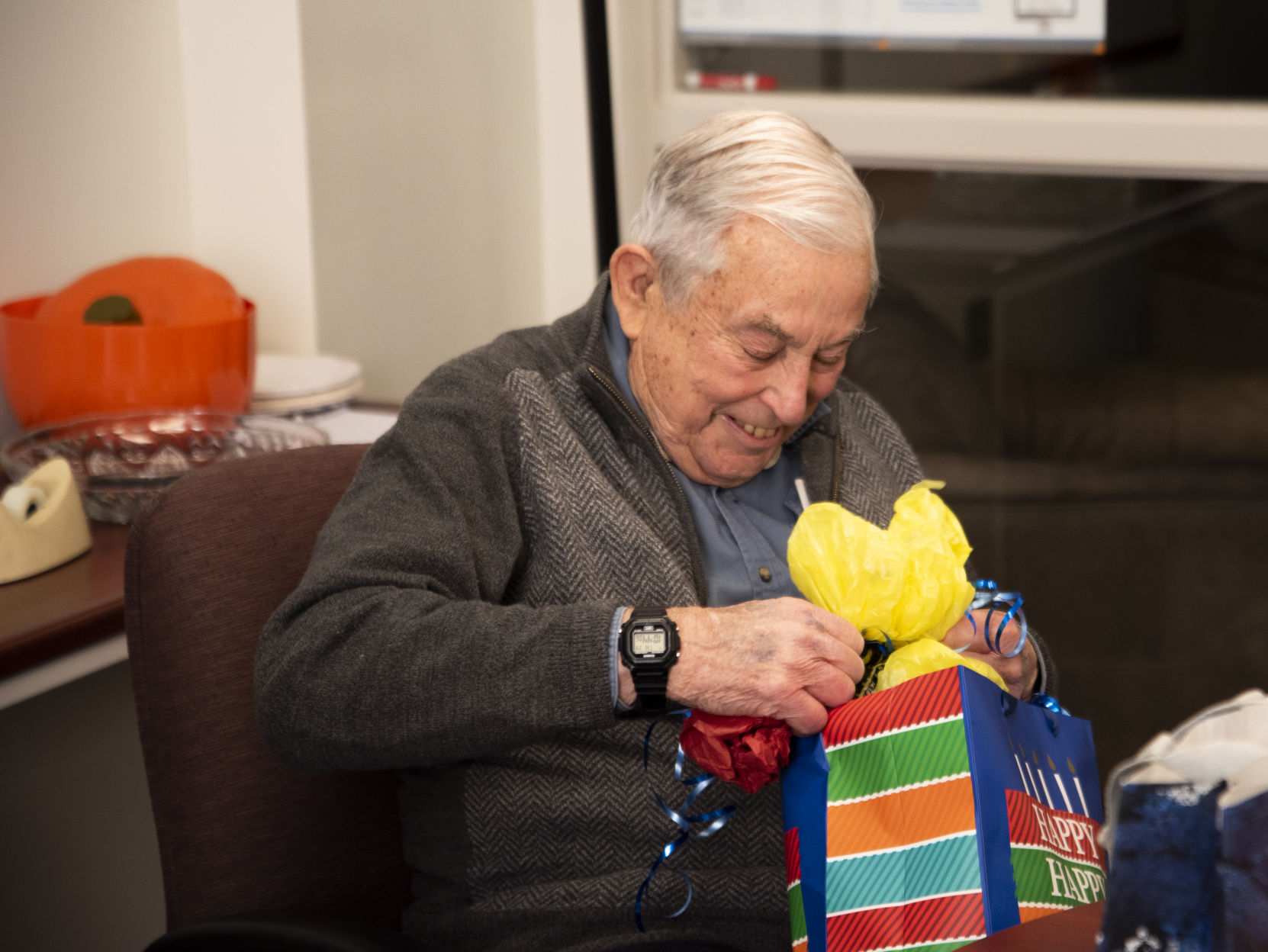 Professor Ted Fuller with presents